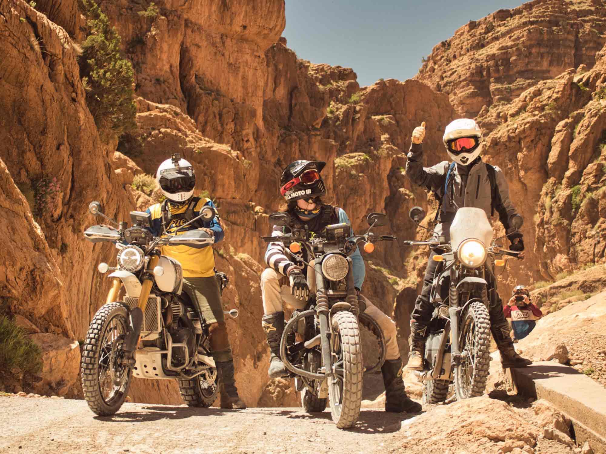 Dominik on the left on his Triumph Scrambler, me in the middle, and David on the right as we pass through Dadès Gorges.