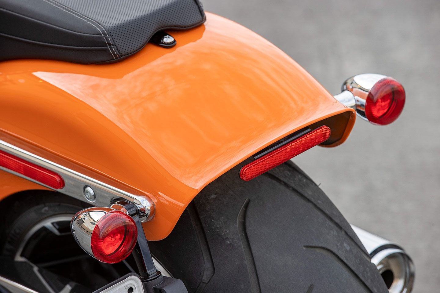 The clean bobbed rear fender features integrated turn signals and brake lights.
