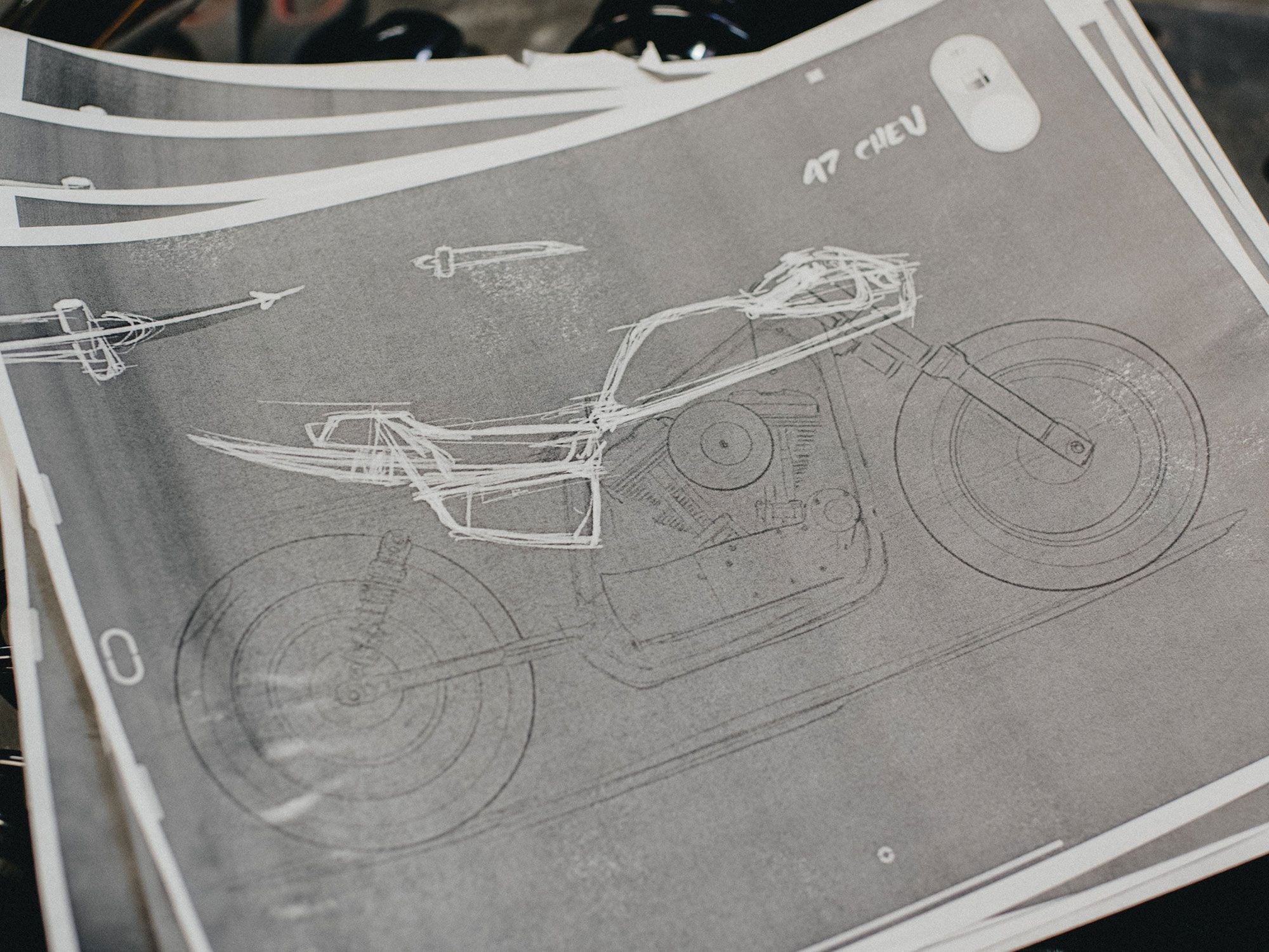 Early sketches for the Sportster build. Some builders prefer to go straight to the form, others like to see it on paper first.