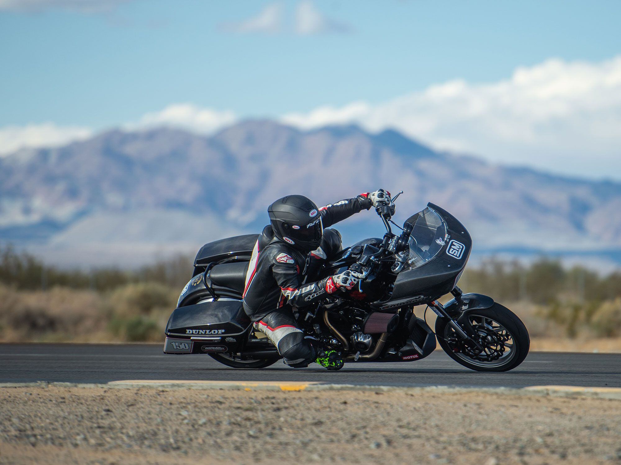 Tony Sollima of Shred Moto Co. finding the limits of his bagger’s lean angle.