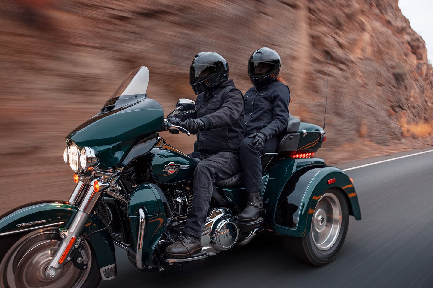 The Tri Glide’s top case includes a plush backrest to boost passenger comfort and safety.