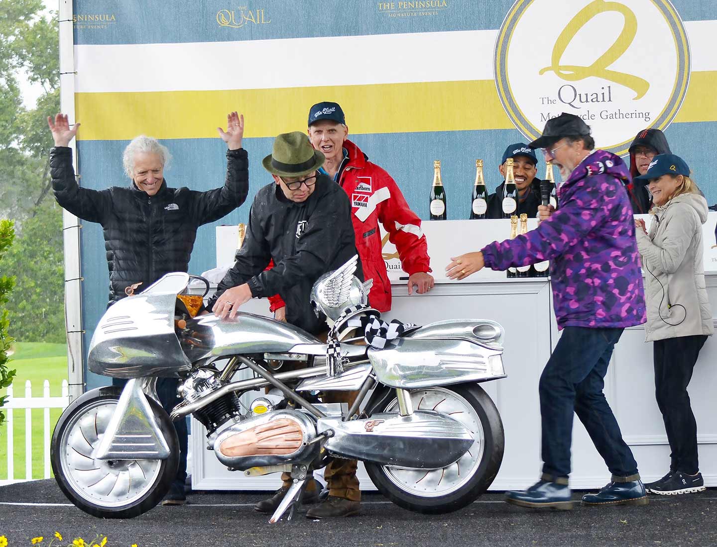 Master of ceremonies Paul d’Orleans seems pretty stoked for Barry Weiss and his wild, Art Deco–inspired Norton Commando, which won the Spirit of the Quail Award.