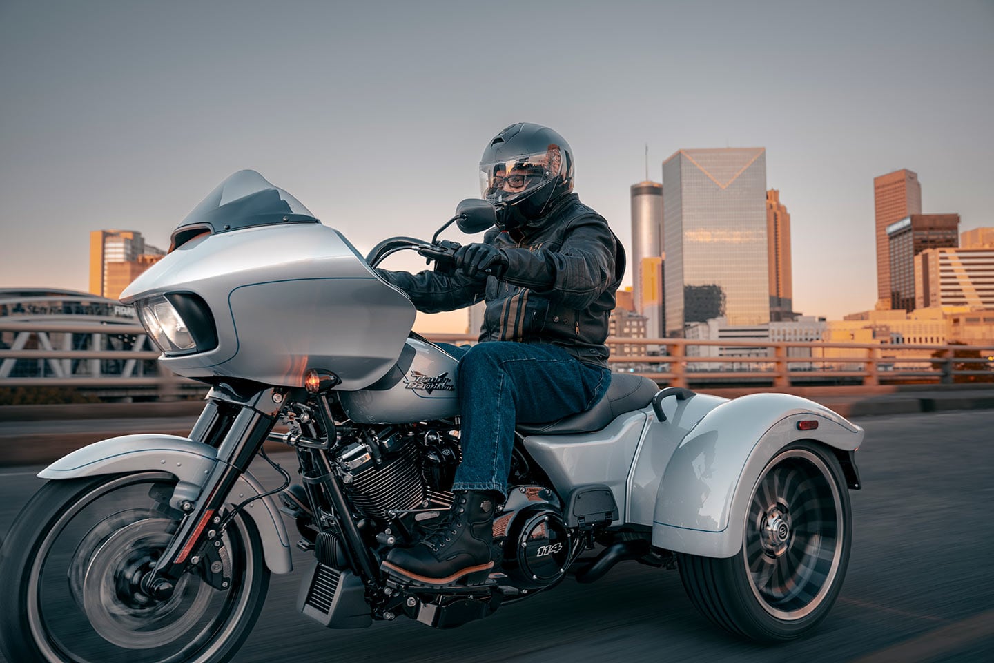The Road Glide 3 in Atlas Silver Metallic ($1,000 extra). With feet-forward ergos and generous wind protection—not to mention a trunk—the Road Glide 3 is ready for you to rack up some miles.